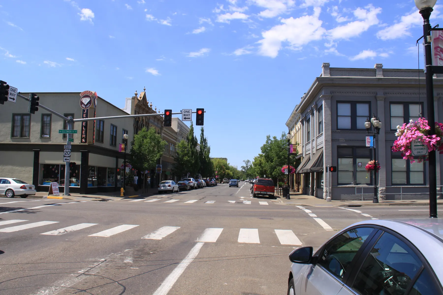 Historic brick storefronts looking west along First Avenue SW in downtown Albany, Oregon